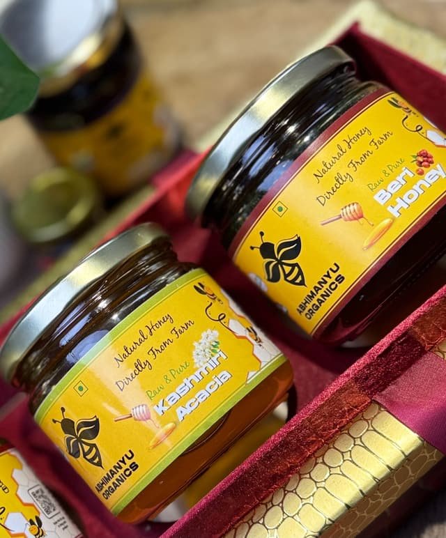 Kashmiri Acacia honey in a maroon and gold gift box